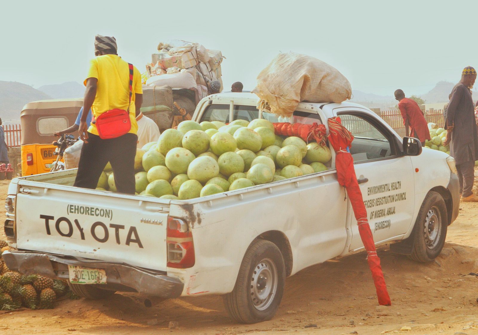 A pickup loaded with market goods