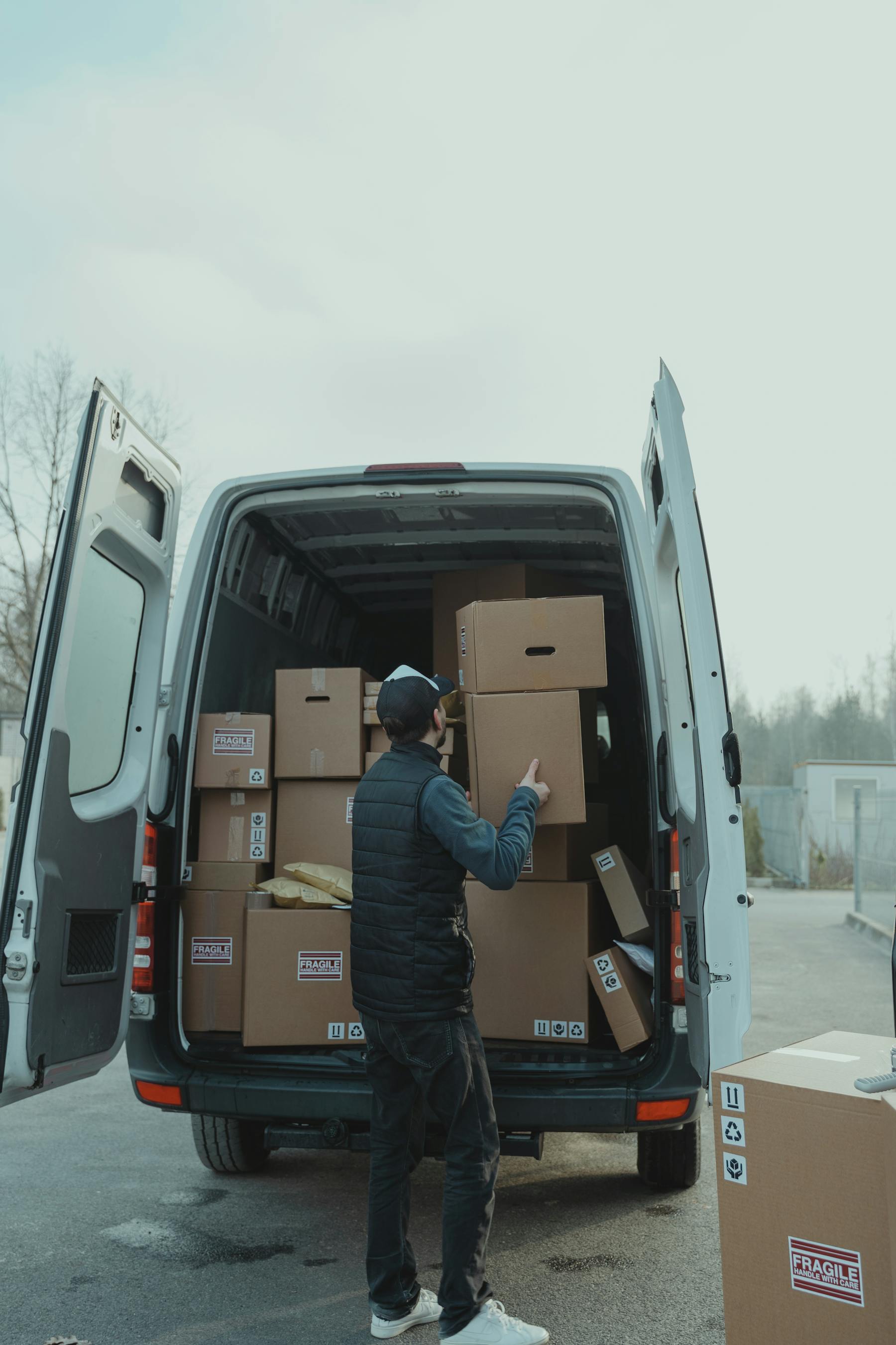 Mover carrying boxes for a residential move