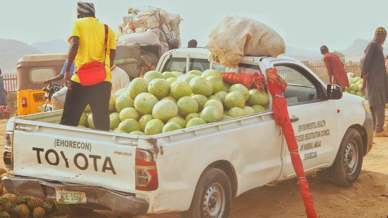 A pickup loaded with market goods