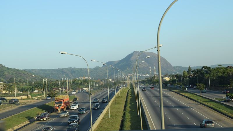 Traffic and a truck on an Abuja road