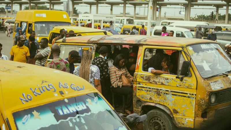 Danfo buses at a Lagos market