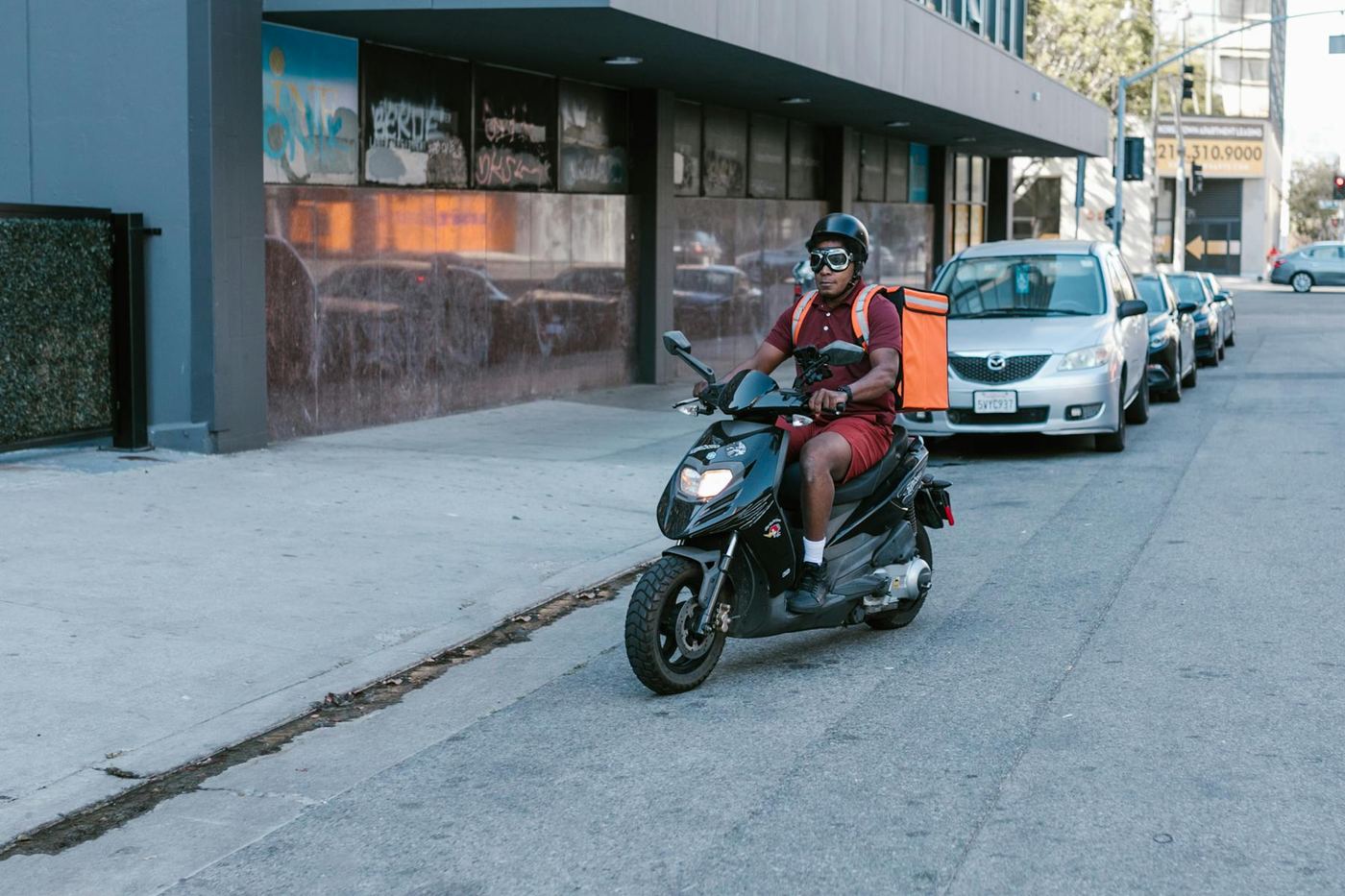 A dispatch rider on a city street