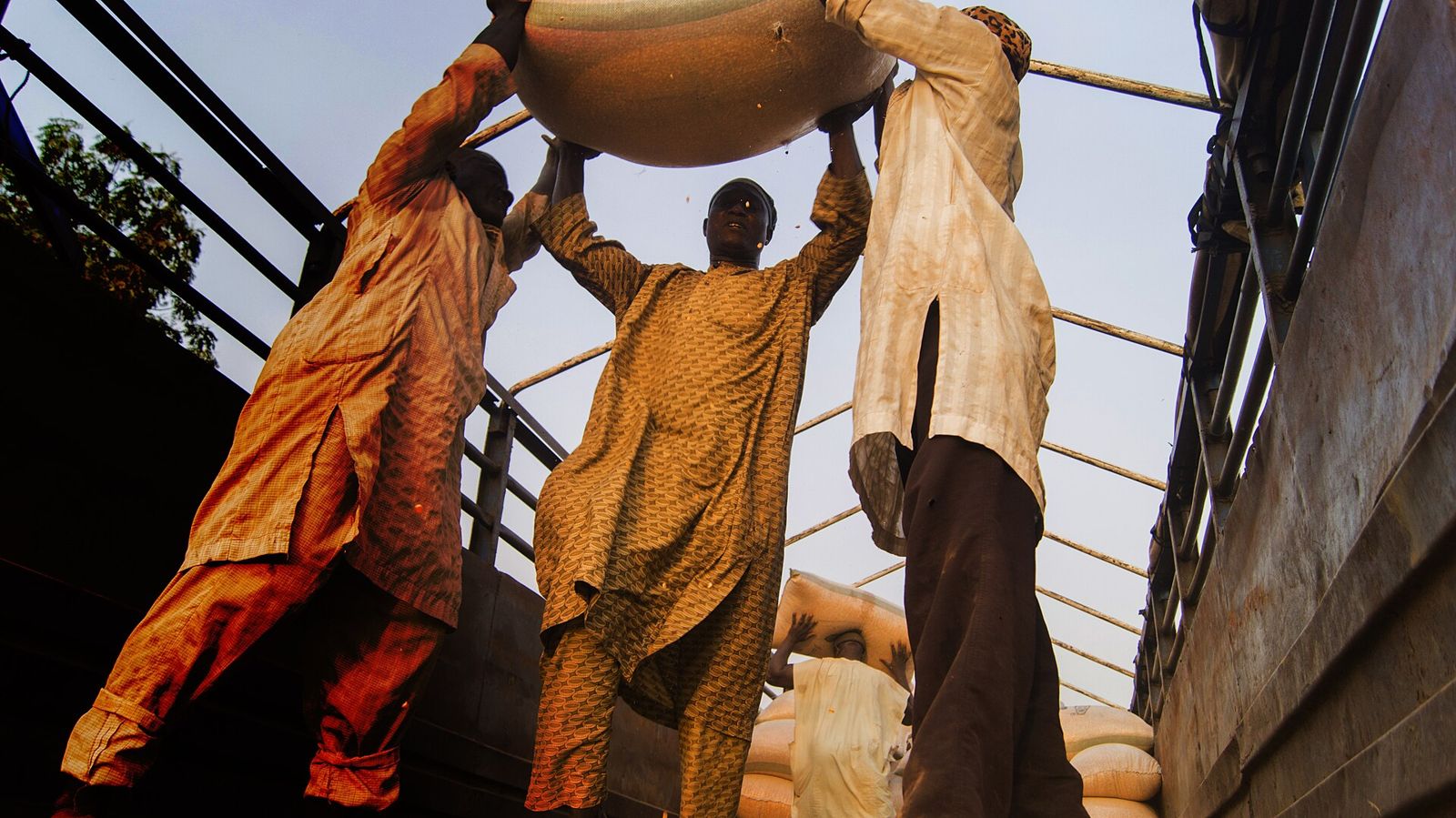 Loading sacks onto a truck