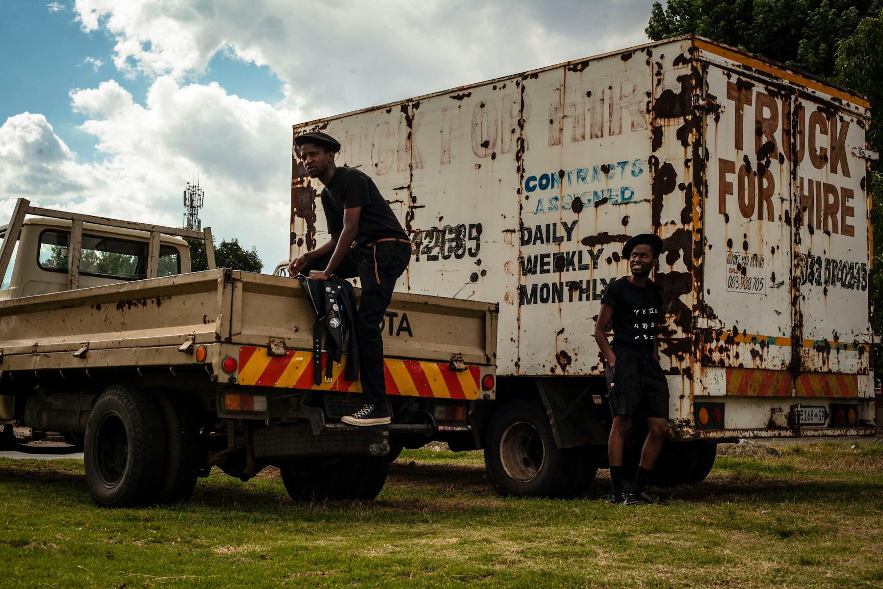 Black logistics workers with freight transport in Africa